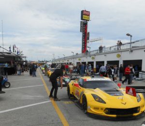 Corvette, now using E20, parades to the track at the Roar before the Rolex 24