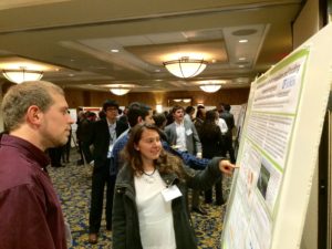 Attendees learn about the latest research during the poster session.